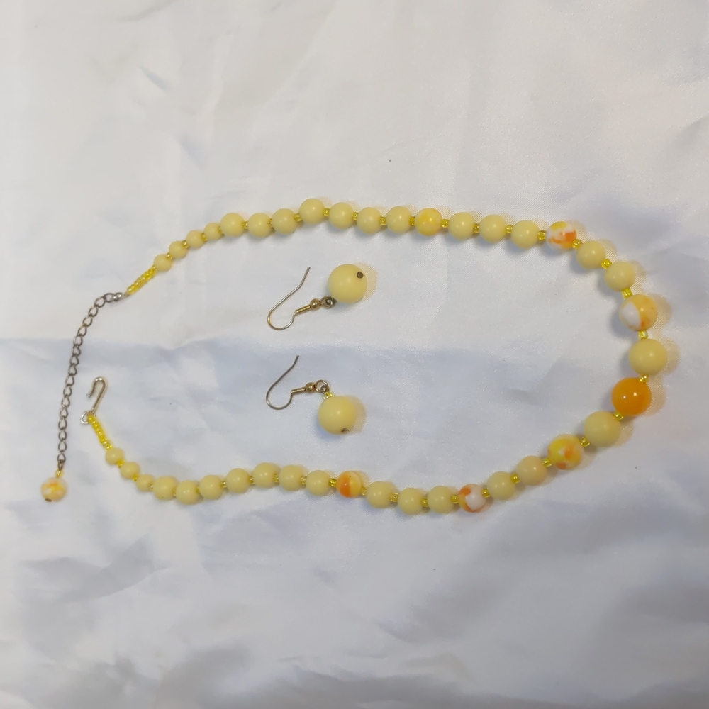 Vintage Adjustable Legnth yellow, orange and white beaded Necklace and Earrings.